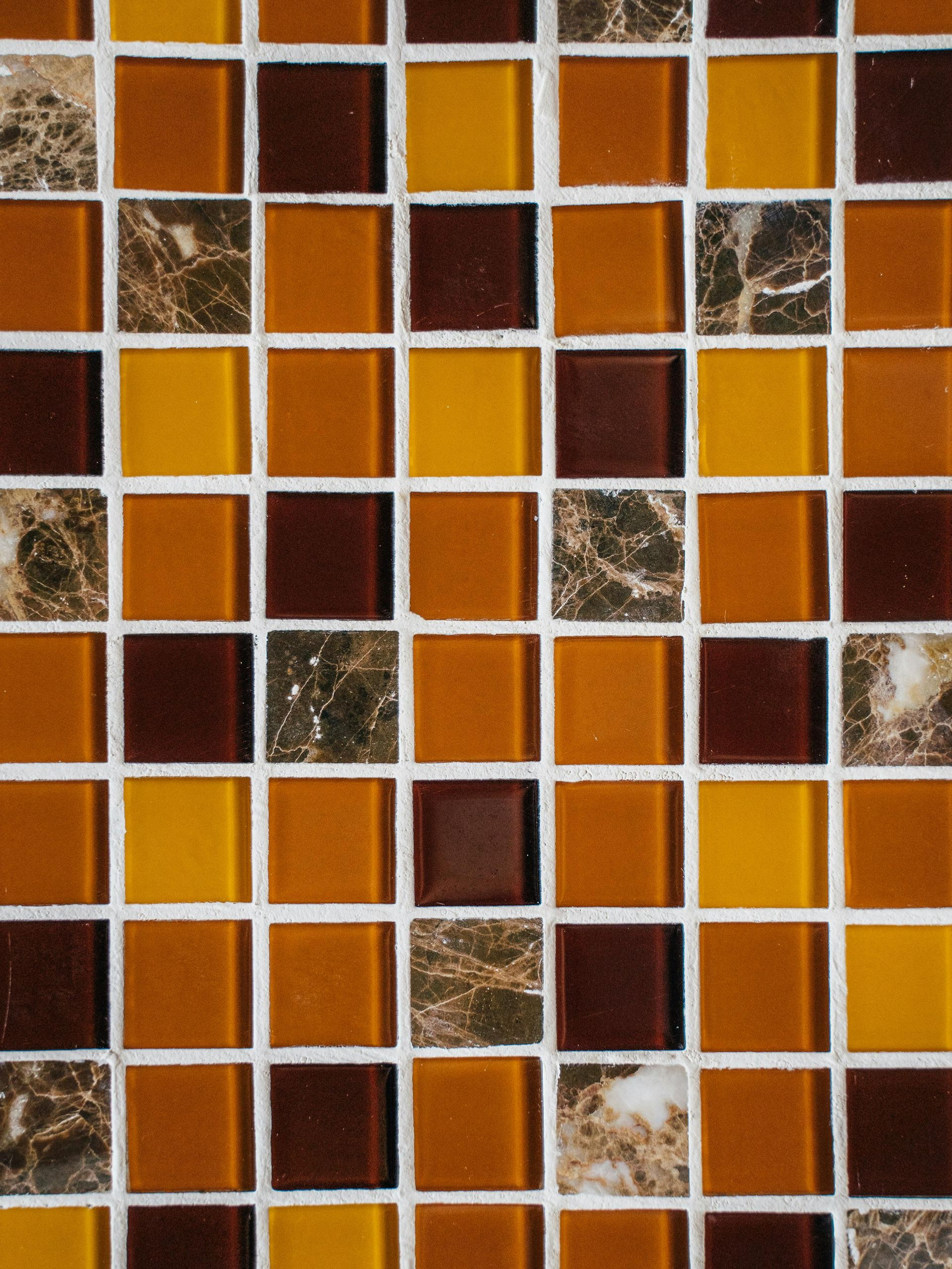 Colorful mosaic tiles in geometric pattern.